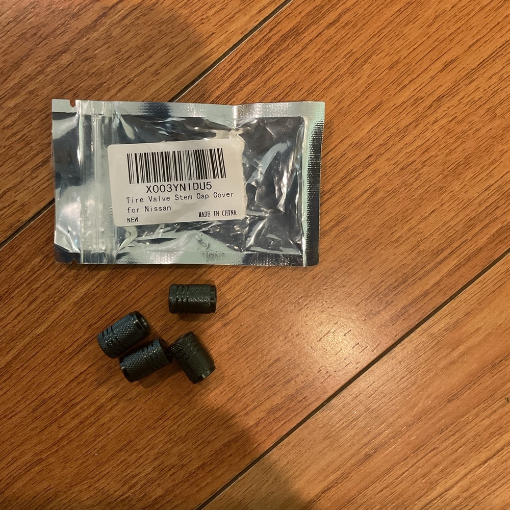 Black Tire Valve Stem Caps for Nissan 4pc